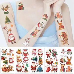 Detail of Christmas temporary tattoos with Santa and reindeer patterns for kids party