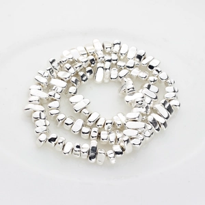 Detailed view of silver plated irregular hematite beads for DIY jewelry making
