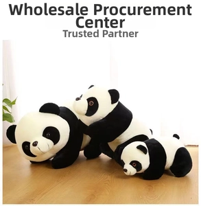 Three plush panda toys in small, medium, and large sizes on a wooden floor