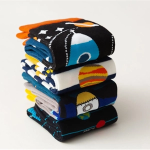 Space-themed cotton crew socks for men featuring astronaut, planet, and rocket patterns