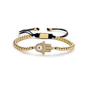 Bracelet à perles dorées avec main de Fatma, oxydes de zirconium et œil bleu réglable