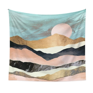 Detail of mountain tapestry showing gold texture and watercolor abstract art