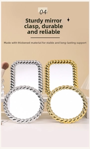 Close-up of vintage ornate gold and silver makeup mirrors with intricate twisted texture