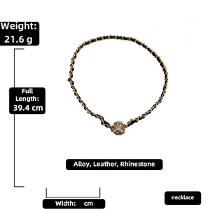 Detail showing gold chain woven with black leather and rhinestone ball pendant dimensions