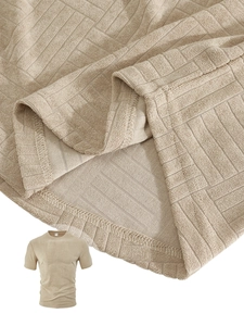 Detail of khaki waffle knit fabric texture and high-quality stitching on a polo shirt