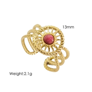 Detail of French vintage gold ring with red gemstone and 13mm woven texture band