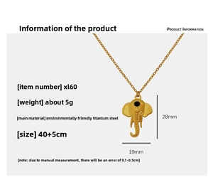 Detailed view of golden elephant pendant necklace made of durable titanium steel