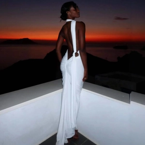 Elegant white backless halter neck maxi evening dress with side ring and ruching detail