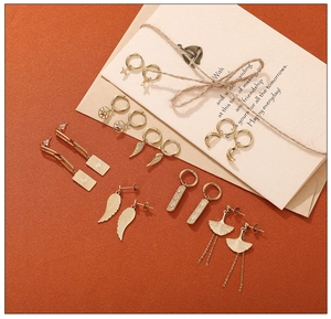 Set of 6 pairs of 18K gold-plated stainless steel earrings with moon and star charms