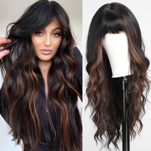 Detail view of long wavy brown highlighted wig with bangs on model and mannequin stand