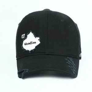 Distressed black cotton baseball cap with maple leaf embroidery and ripped vintage design