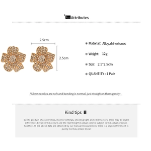 Detail view of 2.5cm rhinestone flower stud earrings with silver needles and alloy material