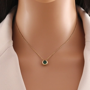 Minimalist gold stainless steel necklace featuring a round green zircon stone pendant
