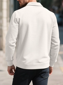 Macro view of white waffle-knit fabric texture and tailored back seam on men's jacket