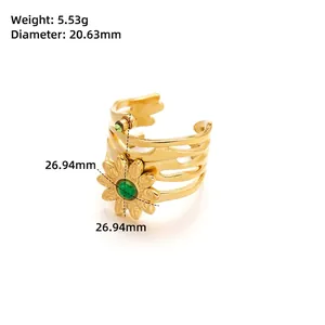 Detailed view of golden flower ring with green stone and precise dimensions of 14.33mm