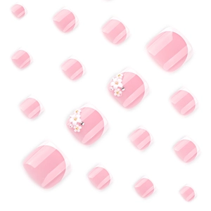 Pink French press-on toenails with 3D white flower accents and delicate rhinestones