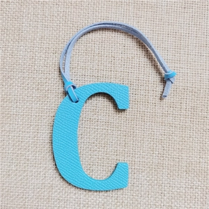 Sky blue litchi pattern leather letter C handbag charm with matching leather strap