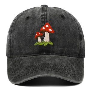 Detailed view of red mushroom embroidery on vintage washed cotton baseball cap