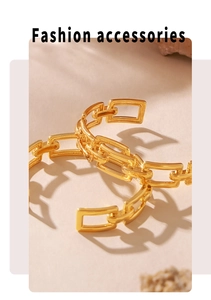 Detailed close-up of 18k gold-plated stainless steel hollow chain bracelet on natural stone