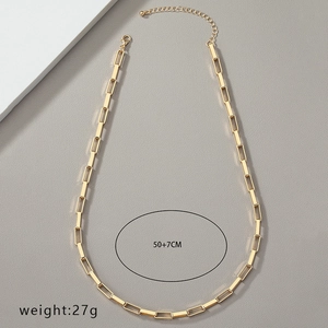 Detail view of gold paperclip chain necklace showing 50+7CM length and 27g weight specs