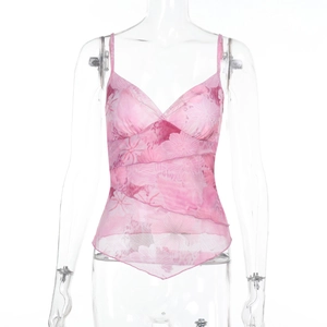 Detailed view of layered pink floral mesh camisole with ruffle trim and y2k style details