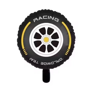 Detail of racing tire foil balloon with black rim and white racing text for party decor