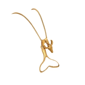 Golden stainless steel necklace with mermaid tail and deer head charms on box chain