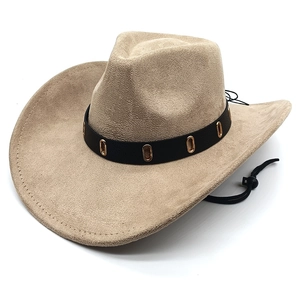 Detail view of beige suede western hat with black leather band and gold buckle detail