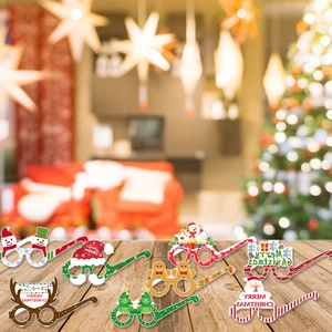 Festive Christmas paper glasses featuring Santa and Reindeer on a cozy wooden table