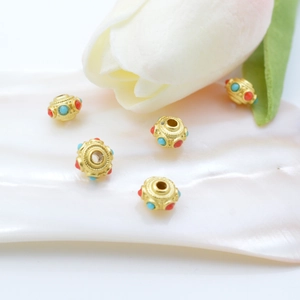 Golden ethnic drum spacer beads with red and blue enamel dots for DIY jewelry making
