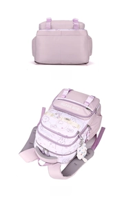 Detail view showing bottom and flat layout of lavender school backpack with plush charm