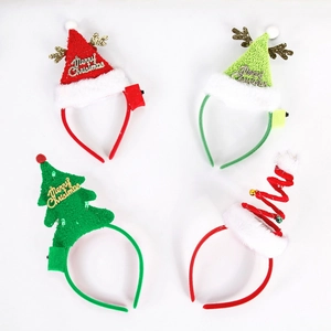 Pack of four glowing Christmas headbands featuring festive tree and Santa hat designs