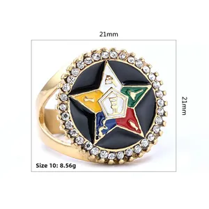 Macro shot of gold star enamel ring with Masonic Eastern Star symbol and crystal pavé