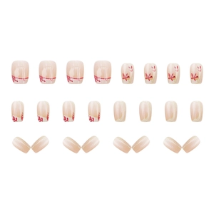 Press-on nails featuring red floral patterns and gold maple leaf accents on square oval tips