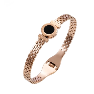 Rose gold stainless steel bracelet with black round charm and Roman numeral engraving