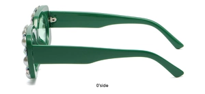 Detail view of green square sunglasses featuring elegant pearl and rhinestone inlay accents