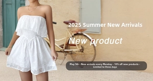 Detailed close-up of white strapless romper featuring ruffle layers and textured fabric