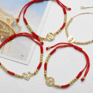 Handmade woven red cord bracelet with 18k gold heart Virgin Mary charms and zircons