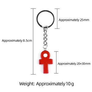 Red stone Ankh keychain with silver ring and size dimensions on white background