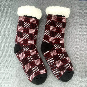 Mens thick thermal knit floor socks with red plaid pattern and non-slip soles