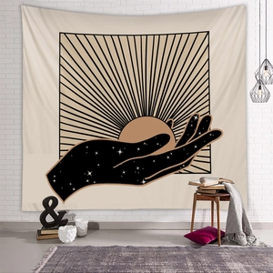 Detail of minimalist Japanese sun and palm tapestry hanging on a white brick wall