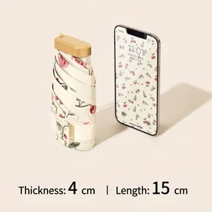 Ultra-light flat cherry print sun umbrella with a compact size of 15cm and 4cm thickness