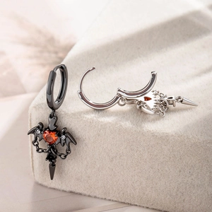 Cool wing chain heart earrings with red zircon in black and silver finishes