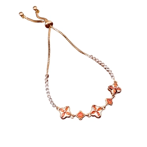 18K gold plated flower bracelet with orange petals and crystals on an adjustable chain
