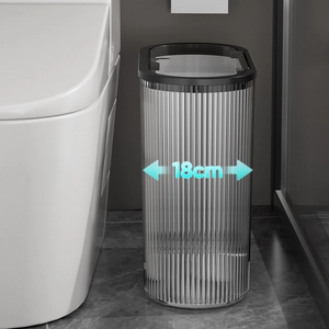 Slim press-top trash can with 18cm width fits perfectly in narrow bathroom gaps
