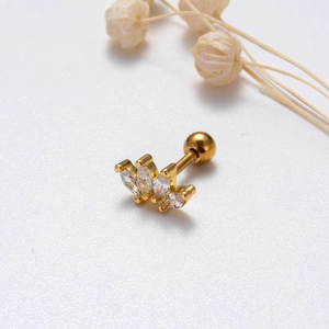 Macro detail of gold helix stud with marquise zircon stones and secure screw ball back