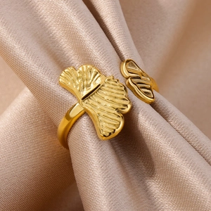 Detailed close-up of 18k gold plated ginkgo leaf ring with fine engraved vein textures