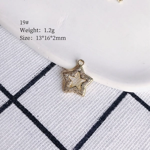 Star-shaped alloy pendant with clear rhinestones, 13x16mm size, weight 1.2g, style 19#