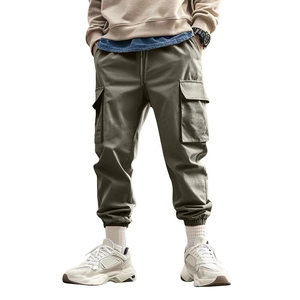 Men's loose cargo pants in army green with multi-pocket design and tapered drawstring waist