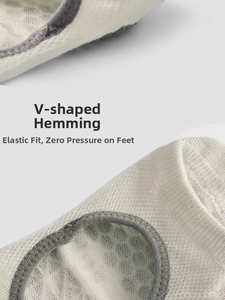 Macro detail of breathable cotton yoga sock featuring elastic herringbone stitched edges